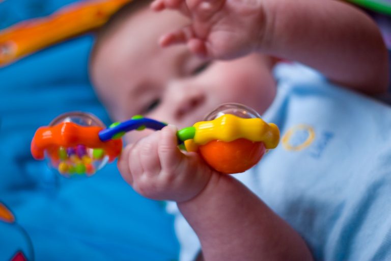 Why Is a Rattle Considered an Essential Toy for Babies?